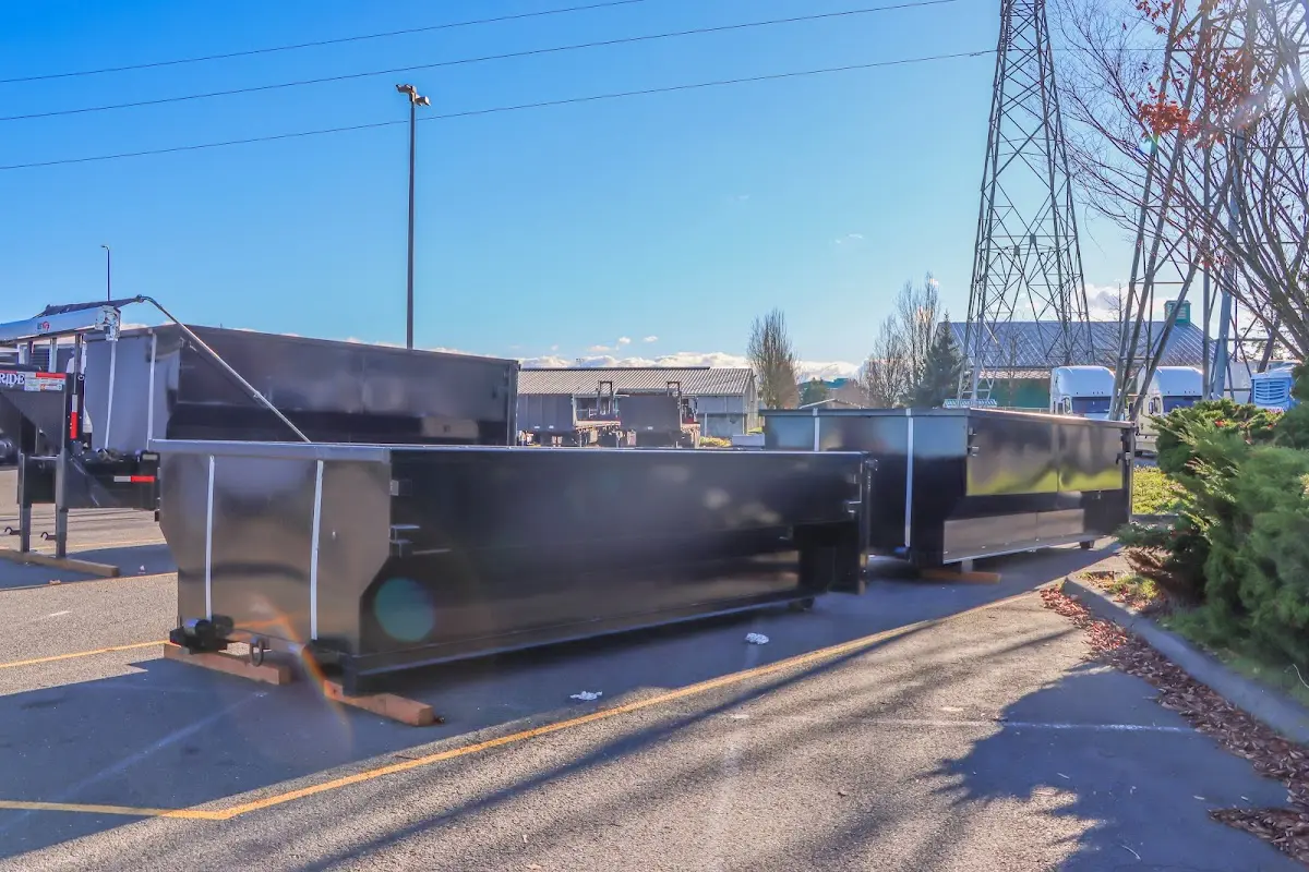 Roll-off dumpster ready for waste disposal at job site for Commercial Dumpster Rental in Lawrence